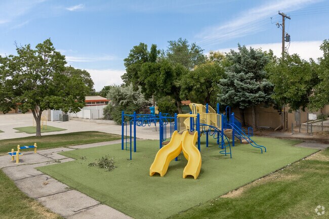 A bright yellow and blue playground at Rosecrest Elementary School.
