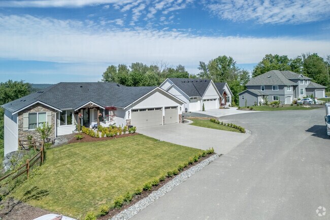 These modern ranch-style homes in Sisco Heights have scenic views of Marysville and beyond.