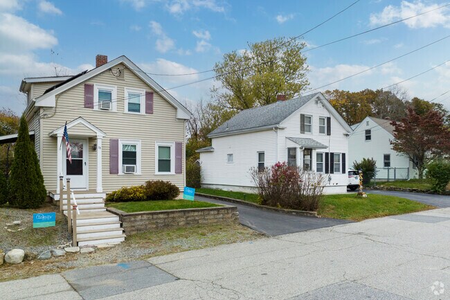 Killingly St homes come with small front yards and neighbors close by.