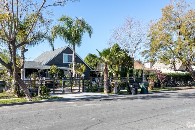Home with beautiful landscaping and trees in Delman, San Bernardino.
