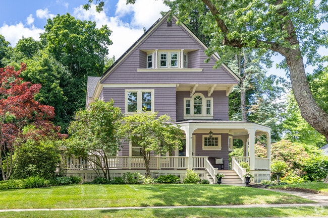 A traditional home found in Munroe Hill with a large wrap around porch.