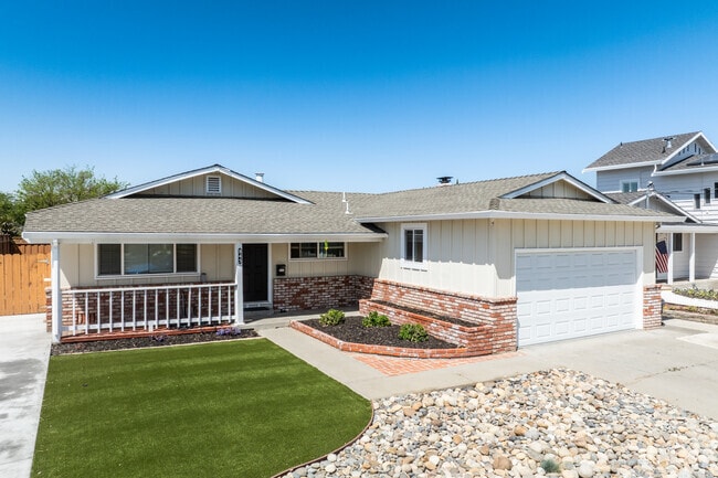 The neighborhood’s consistent architecture creates a cohesive and charming streetscape.