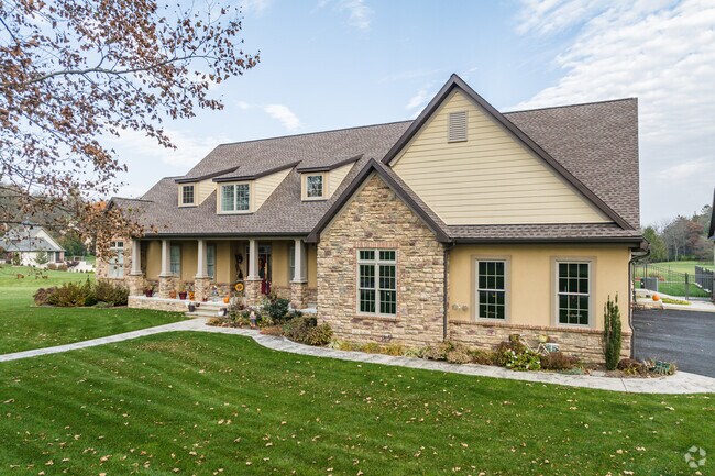 Embrace the charm of Ontelaunee, PA, with this modern farmhouse nestled in the heart of nature.