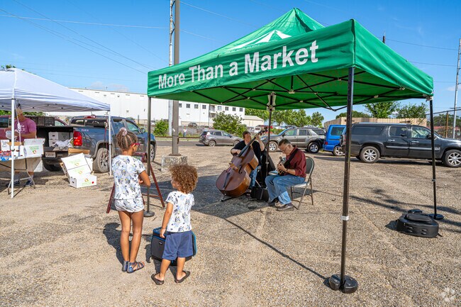 Enjoy live music at the Crescent City Farmer's Market near Audubon.
