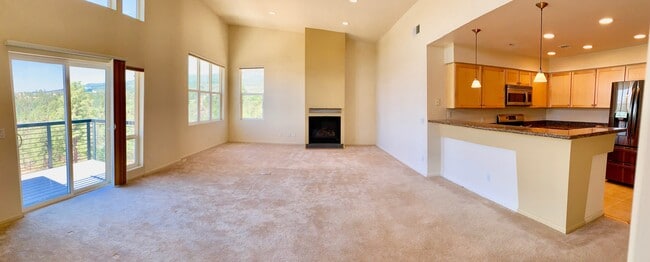 High ceilings, spacious living & dining space, gas fireplace