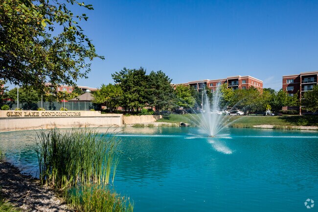 Glen Lake Condos in Dunning features well maintained landscaping which includes a fountain.
