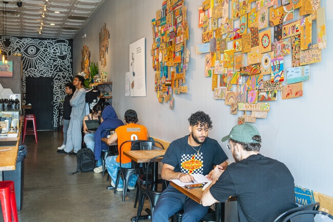 Grab a coffee and enjoy eclectic art pieces on the walls at The Joint Coffee Co. in Fullerton.