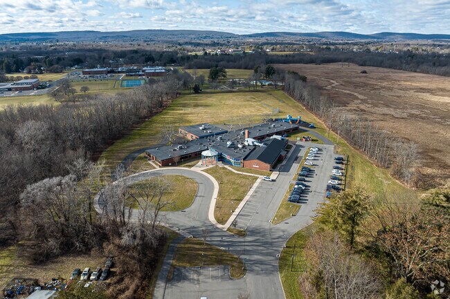 Metacomet School has 233 third and fourth grade students enrolled.