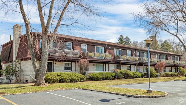 Valley Cottage presents sophisticated condo living, where comfort meets convenience in a serene setting.