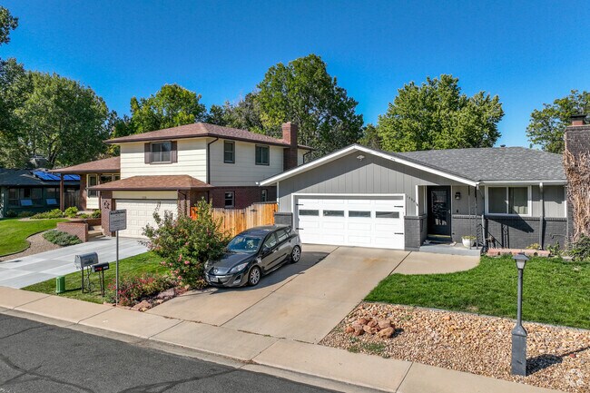 Homes in Garden Acres are lined along residential streets with manicured, grassy lawns.