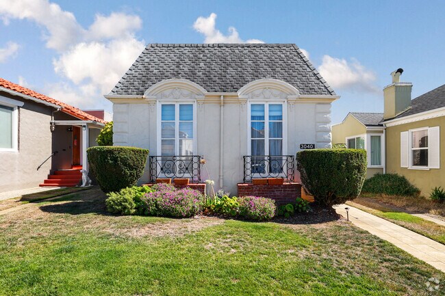 A tightly manicured lawn is emblematic to the homes of Merced Manor.