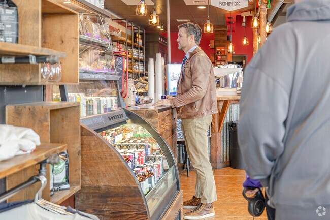 A customer awaits his caffeine fix at Anthem Coffee & Tea.