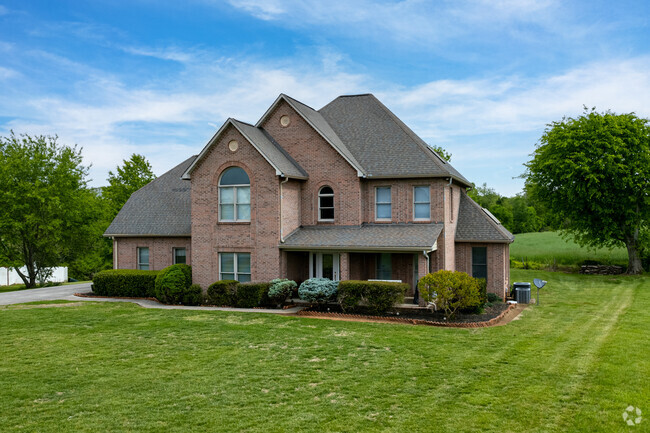 You can find Tudor revivals in the newer subdivisions of Walland.
