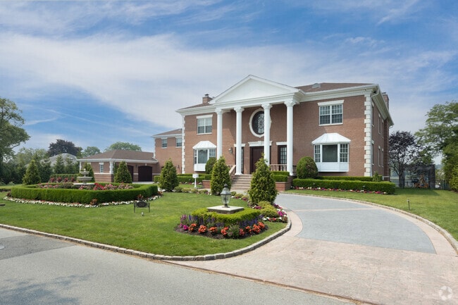 Many Hewlett Harbor, NY homes are set back off the road and have circular driveways.