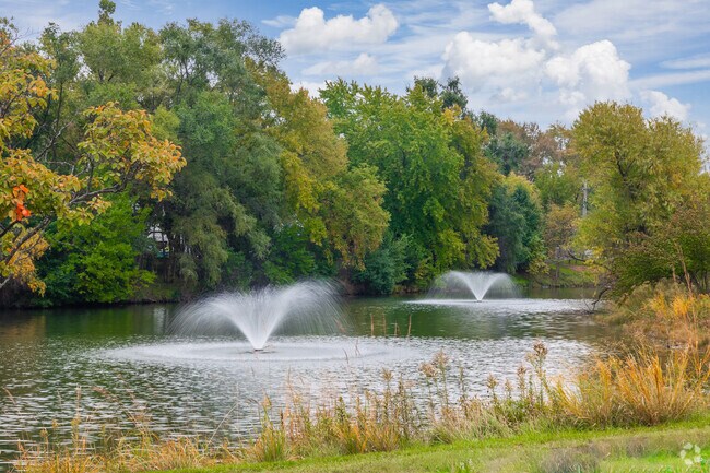 Enjoy the scenic views of a smaller pond in Third Lake while on a morning walk.