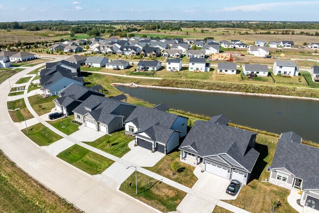 The new development on the north side of Westridge is centered around a park and pond.