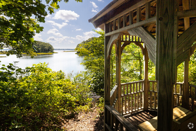 Along a hiking path, visitors can rest at a gazebo to observe wildlife.