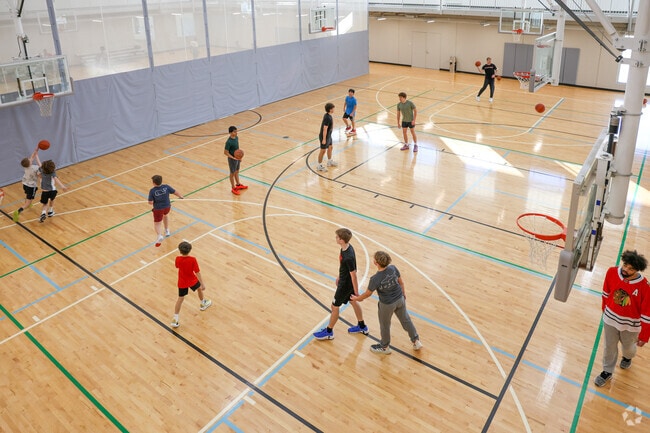 Kids of all ages can burn off energy with a pickup game of basketball at the rec center.