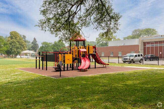 Dunne Technology Academy has a playground and open green grass space.