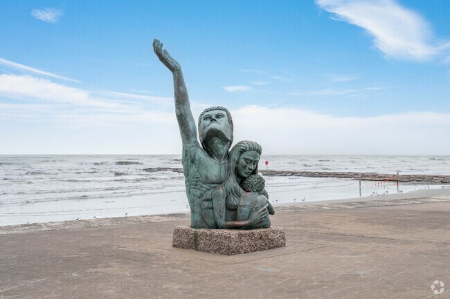 The 1900 Storm Statue was created by local Galveston resident David W. Moore in 2000.