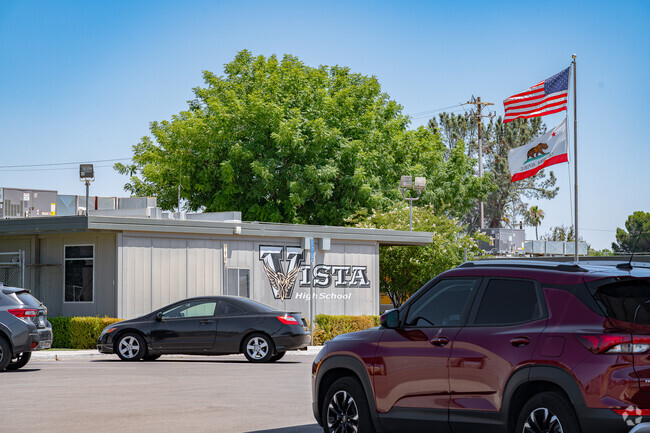 The flags fly high in the front of Vista Continuation High School.