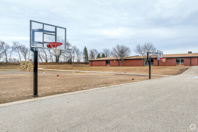The large basketball court is great for recess games and physical education.