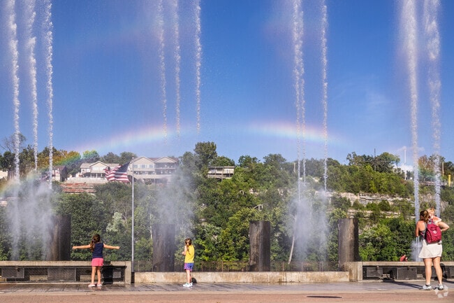 North Branson residents enjoy the fountain show at The Landing.