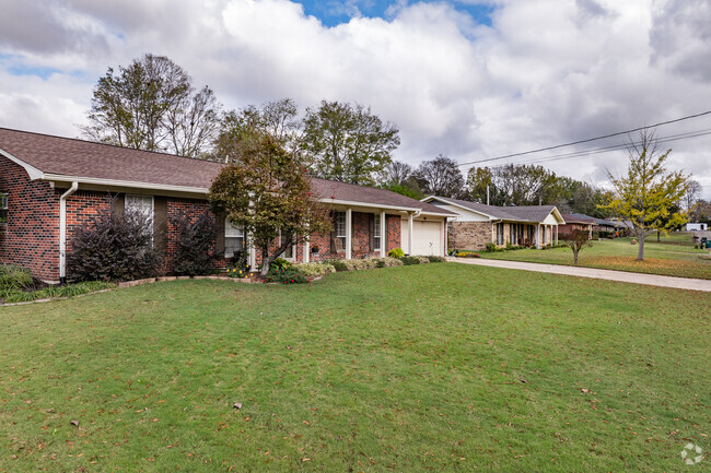Wide, low ranch homes line Lee Acres' residential streets.