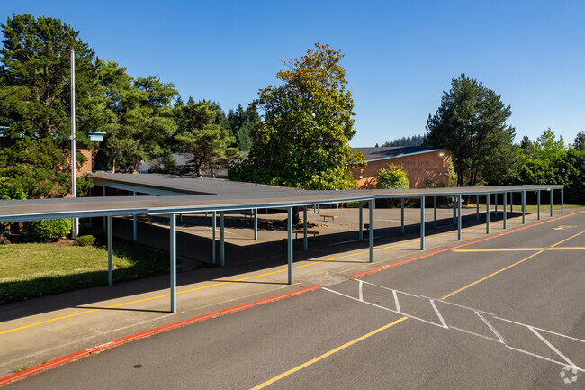 A covered drop off area for the rainy season at Floyd Light Middle School.