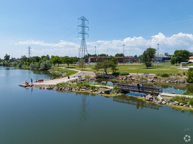 Enjoy serene lake-side walks at Centennial Park in Englewood.