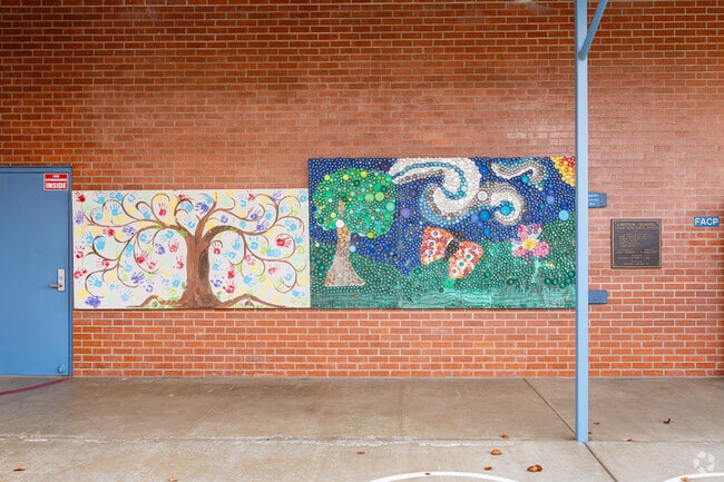 A beautiful mural greets students as they enter Lincoln Elementary School in Exeter.