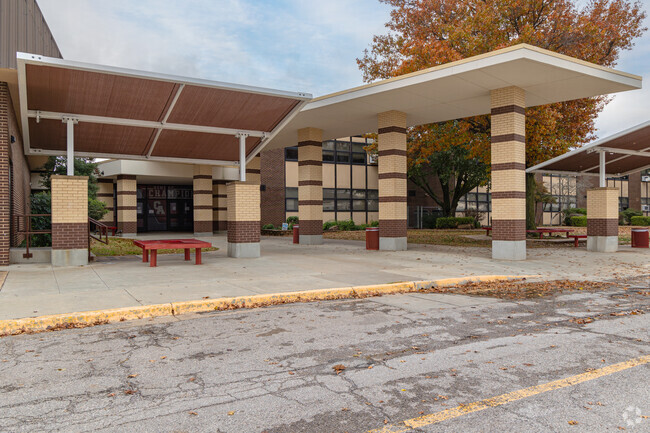 Stay dry while coming and going to Carl Albert Middle School.