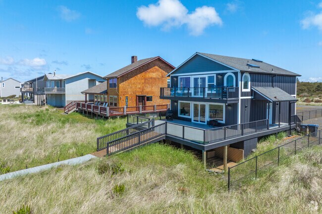 Large and Impressive Westport beach homes are down private streets leading to the water.