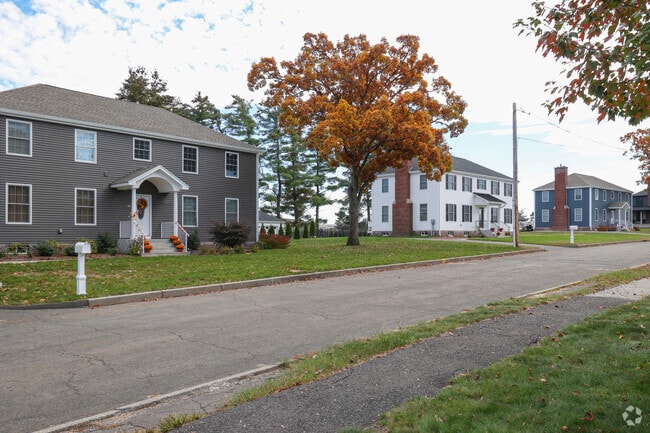 Colonial home line the outside of the Air Base in Westover.