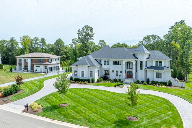 Large new American style homes are common on the outskirts of the neighborhood.