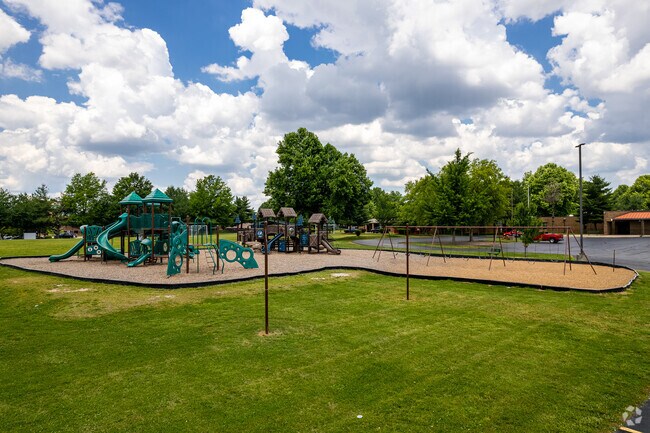 Immaculate Conception School campus includes a large playground area.