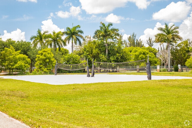 Play a friendly volleyball match on the court at the Mayor Roscoe Warren Municipal Park