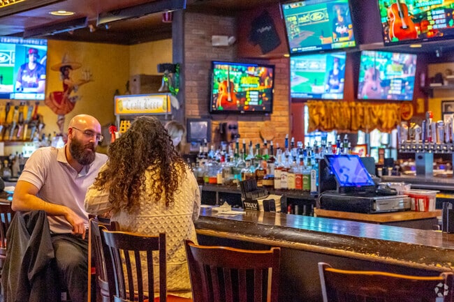 Locals can sit at the bar and enjoy a rotating draft list in Logan Township at The Village Pub.