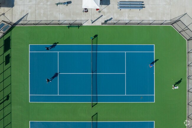 Join Adams Boulevard friends for an afternoon of doubles at Ojibway Island City Park.