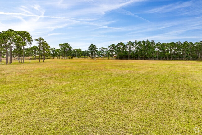 Turner Elementary School features a large open grass sports field.