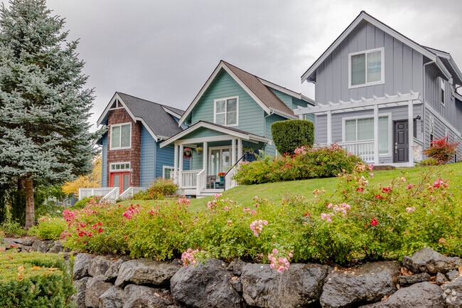 A row of single family contemporary cottages in Gig Harbor North.