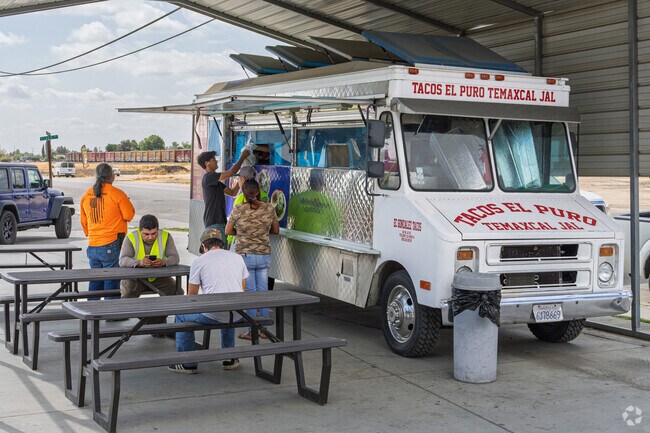 Goshen residents wait for some delicious tacos from one of the food trucks in town.
