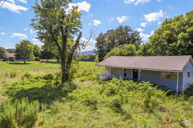 Older homes of High Point are planted on minimally touched natural landscapes.