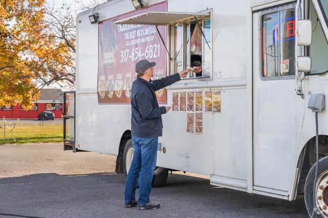 Far Eastside locals stop by local food trucks like Taqueria Los Potrillos for authentic tacos.