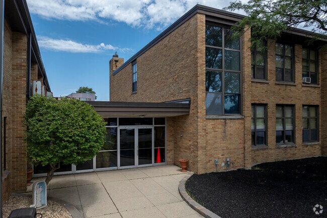 Queen of Martyrs Catholic School serves grades PK, K-8.