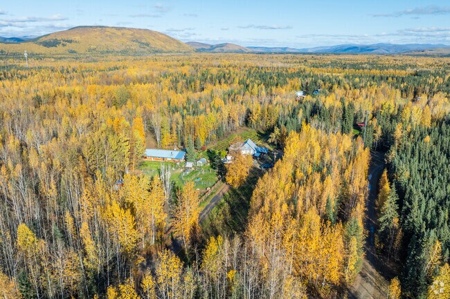 Most homes in Pleasant Valley are secluded on plots of land that are surrounded by trees.