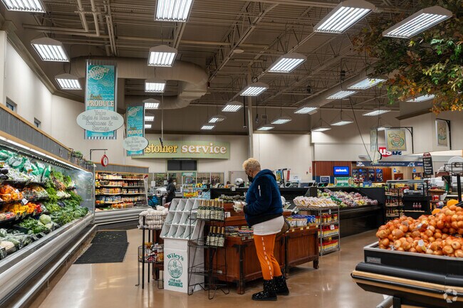 Residents of Middlebury shop at Dave's Market.