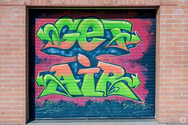 Local art is exhibited at Brannon Crossing's Get Air Trampoline Park.