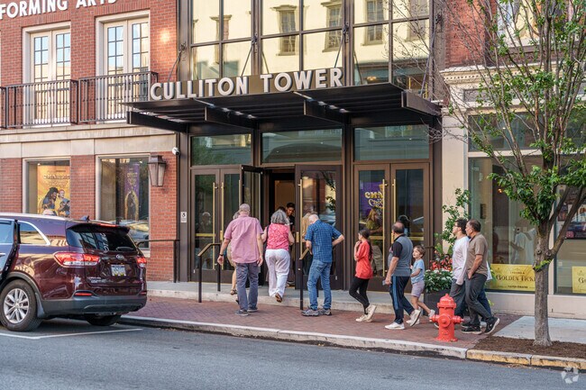 Folks start to stream in for a live performance at