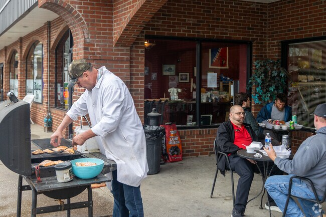 Jimmy, the owner of Butchers Best Meats, grills every day for his lunch crowd.